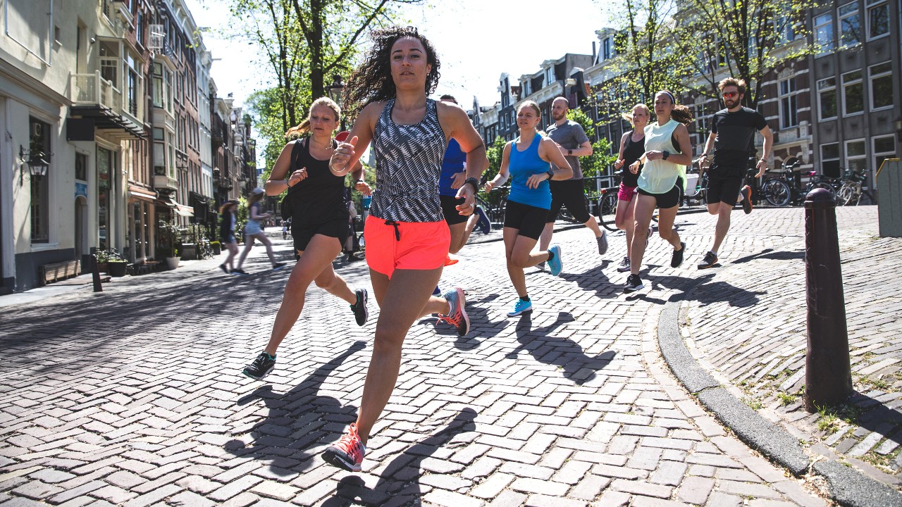 Women running in a city