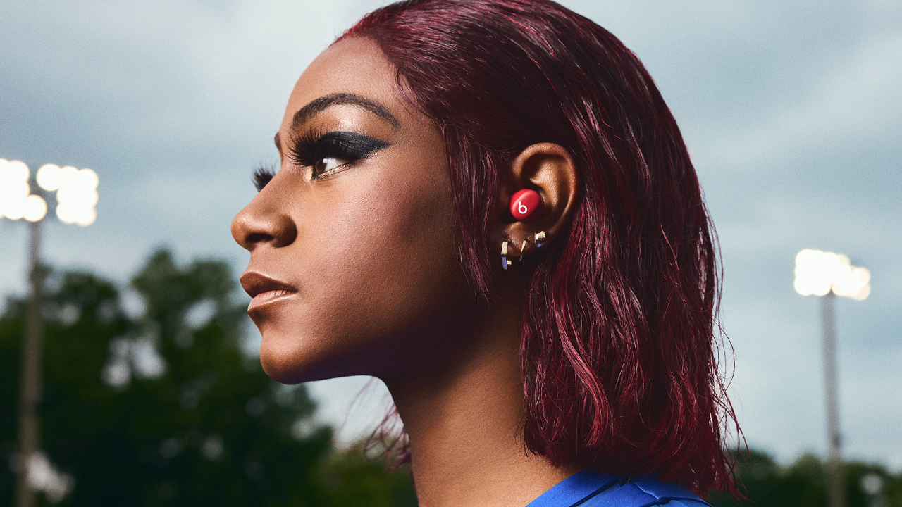 Sha'Carri Richardson wearing Beats Solo Buds